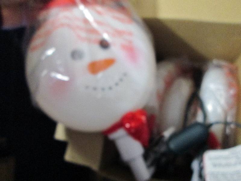 lot 16 image: 4 Count Snowmen Outdoor Lights test...