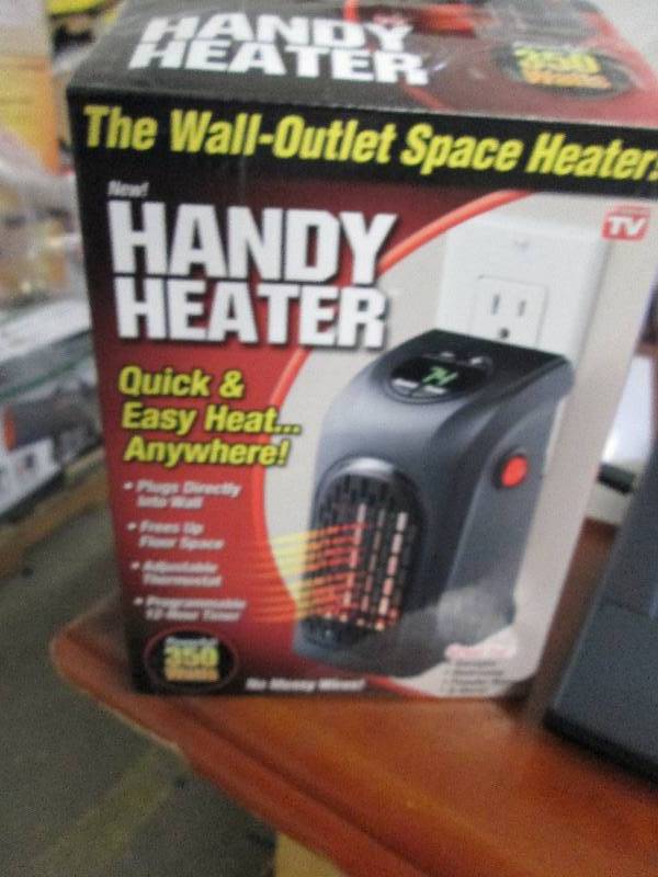 lot 19 image: 350-Watt Wall Outlet Handy Heater o...