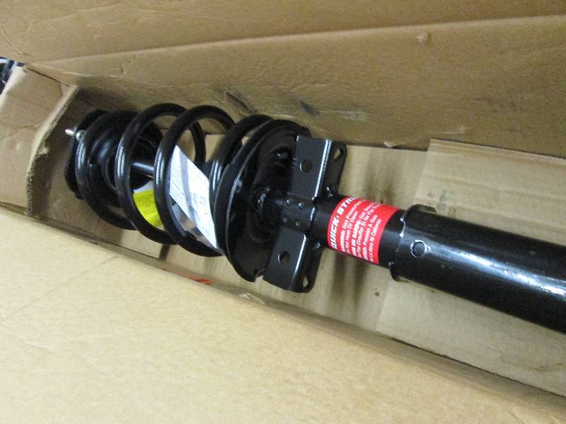 lot 64 image: Suspension Strut & Coil Spring Asse...