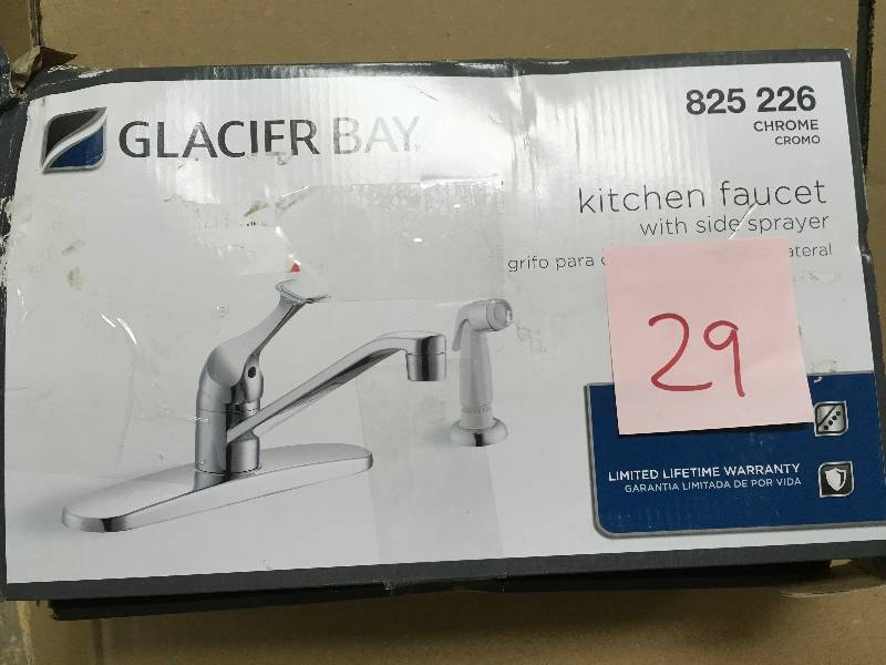 lot 29 image: Glacier Bay Single-Handle Standard Kitchen Faucet with White Side Sprayer in Chrome in like new condition