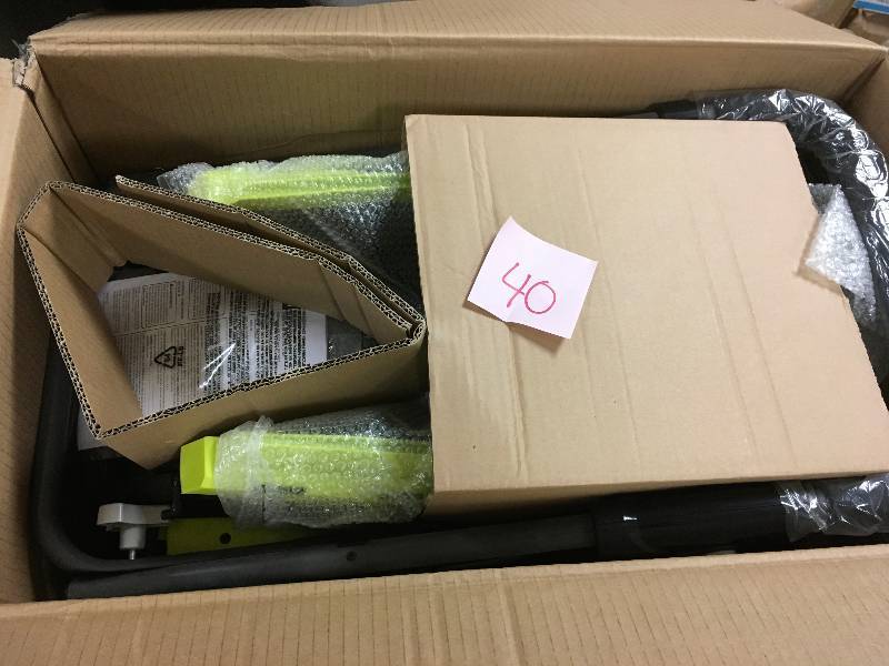 lot 40 image: Ryobi 13 in. 11 Amp Corded Electric Walk Behind Push Mower in good working condition
