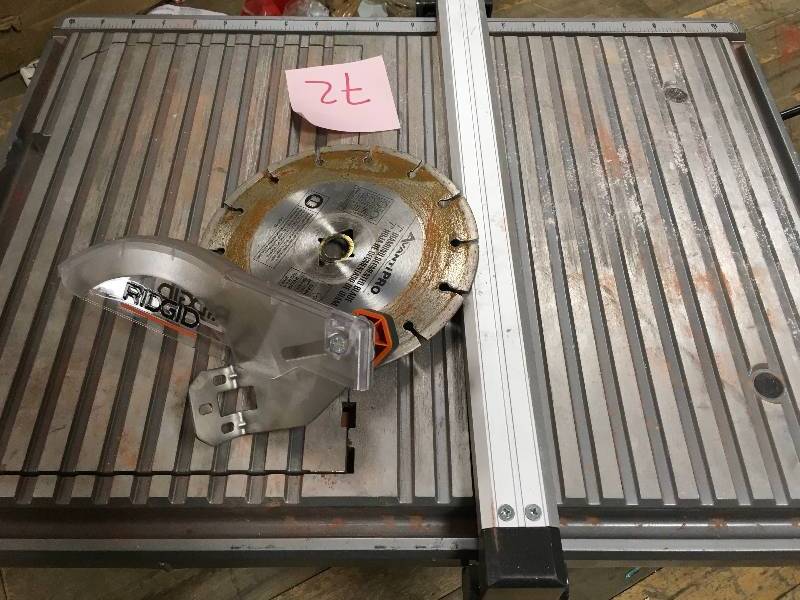 lot 72 image: RIDGID 120-Volt 7 in. Table Top Wet Tile Saw  USED