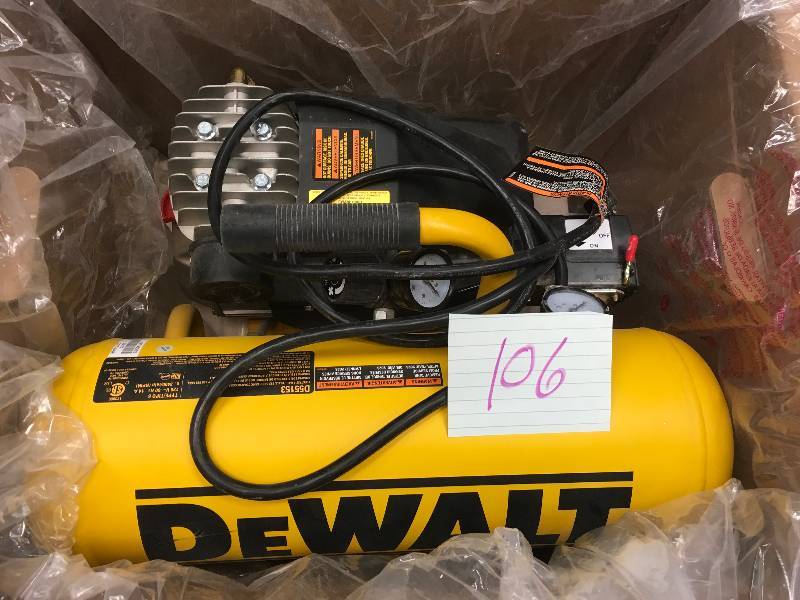 lot 106 image: DEWALT 4 Gal. Portable Electric Air Compressor used in working condition