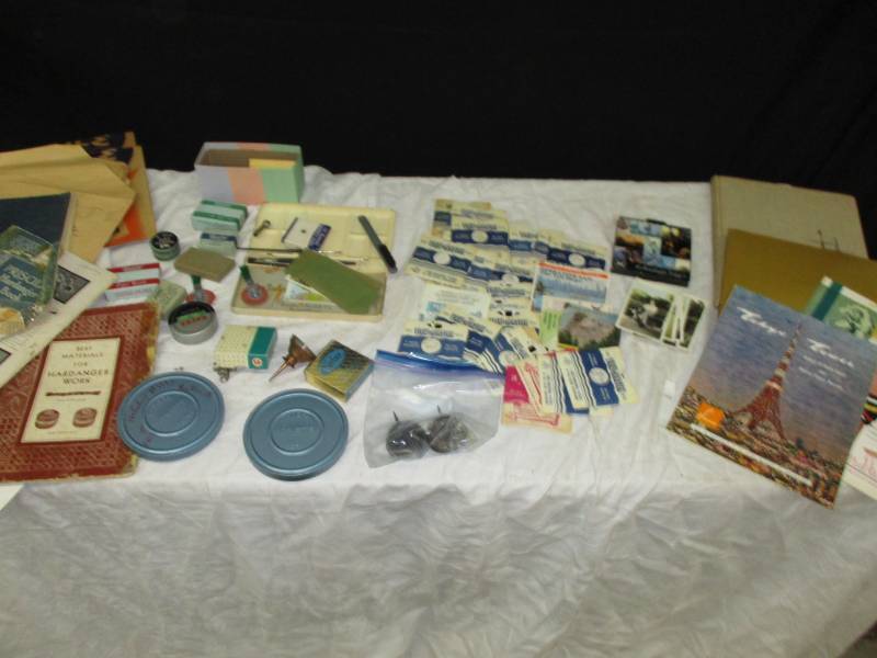Multiple books, 3-dimensional picture viewers, Camera film with containers, ink, and coloring supplies