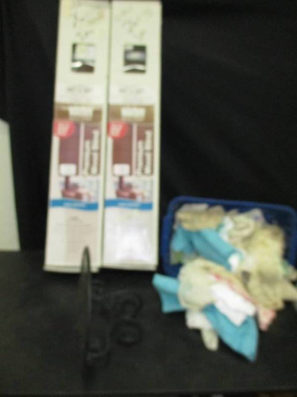unopened shades, doilies and shelf