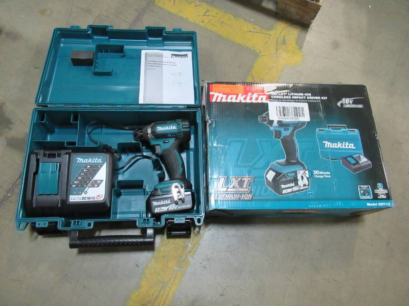 lot 28 image: NEW IN BOX Makita 18-Volt LXT Lithium-Ion Cordless 14 in. Impact Driver Kit with 3.0 Ah Battery, Rapid Charger and Hard Case XDT111