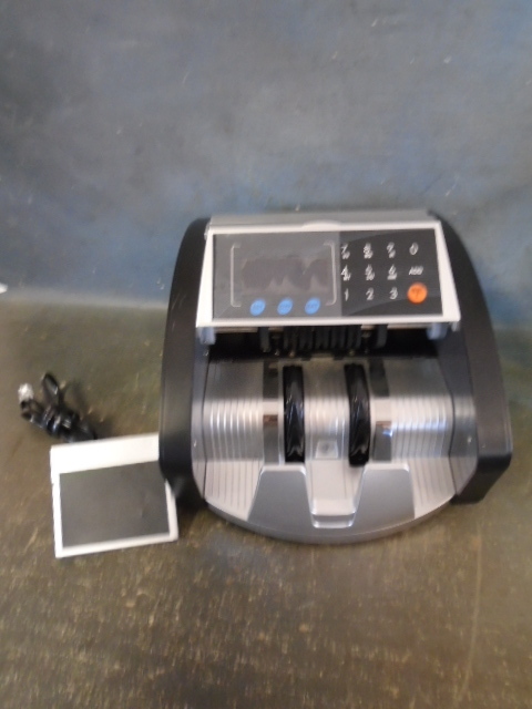 lot 24 image: Electric Bill Counting Machine