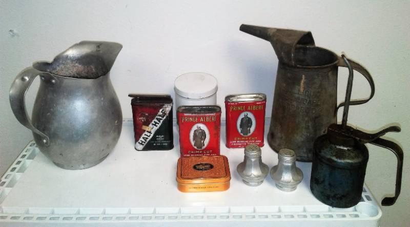 lot 6 image: Vintage tins, oil cans, pitcher & more.