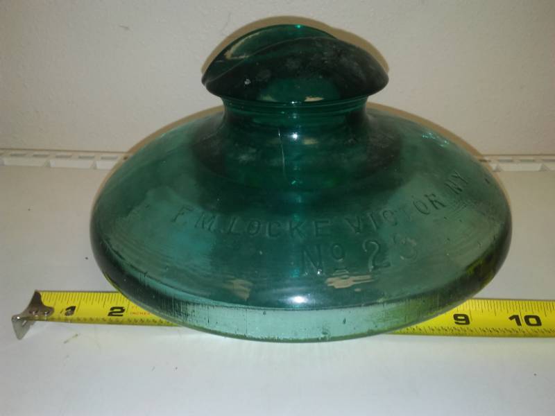 lot 8 image: Huge Green Glass insulator