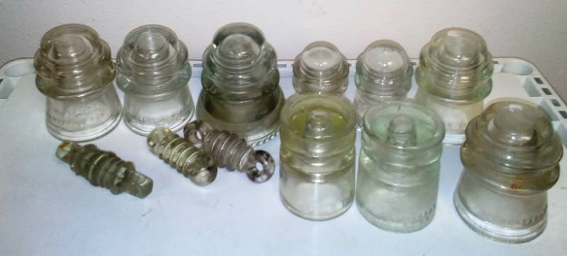 lot 28 image: 12 clear glass insulators - Variety.