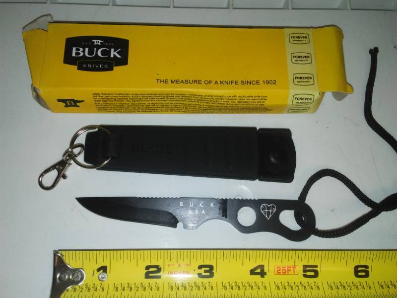lot 48 image: New buck knife straight knife with abs sheath and belt clip.