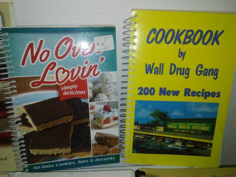 lot 65 image: Dozens of cookbooks.