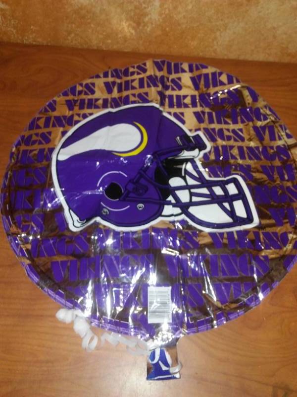 lot 123 image: 24 Minnesota Vikings mylar helium balloons team NFL on reverse.