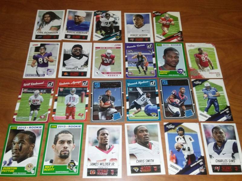 lot 125 image: 23 NFL Rookie Cards,  NEW and Perfect