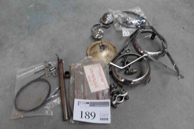 lot 189 image: Cushman Misc. Parts - Cables, Mounts, Headlight Bezel, Transmission Inspection Doors, And More