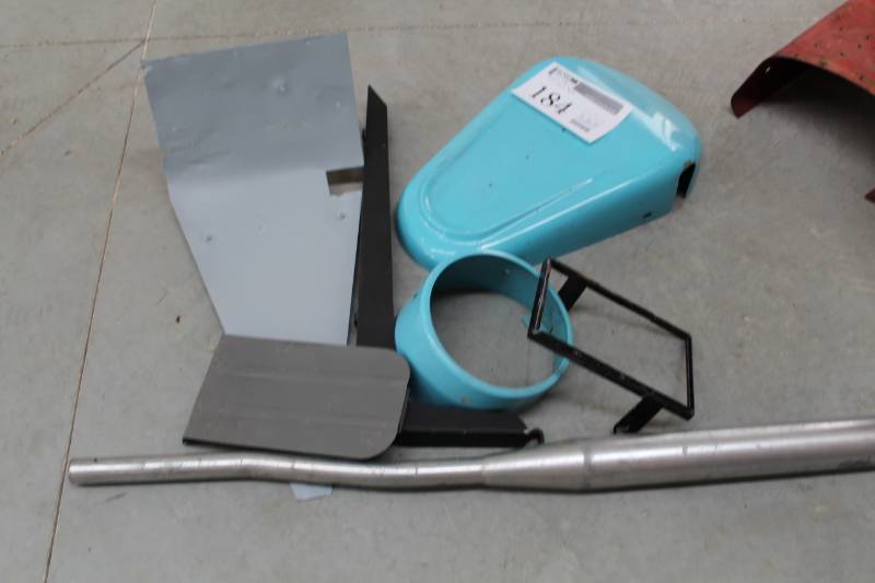 lot 184 image: 1960s Cushman Eagle Parts - Gas Tank Cover, Shroud, Brackets, Exhaust