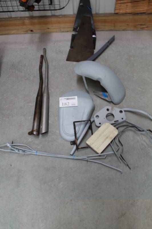 lot 182 image: 1960s Cushman Eagle Parts - Tank Cover, Fender, Mounts, Exhaust, And More
