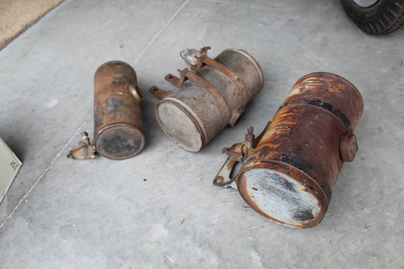 lot 195 image: Cushman Gasoline Tanks