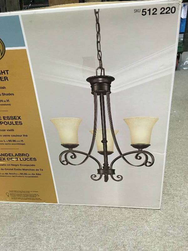 lot 62 image: Hampton Bay Essex 3-Light Aged Black Chandelier with Tea Stained Glass Shades new