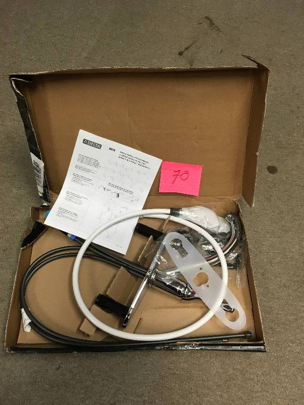 lot 70 image: Delta Kitchen Faucet Chrome Single Handle With Spray not used
