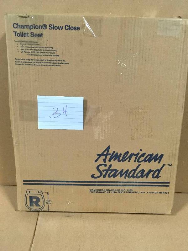 lot 34 image: American Standard Champion Round Slow Closed Front Toilet Seat with Cover in White not used
