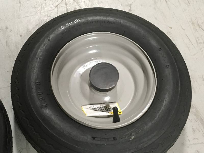 lot 53 image: Martin Wheel 480400-8 LRB Tire and Wheel with 34 in. Bearing for Log SplitterTrailer LOT OF 2 not used