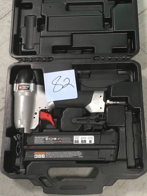 lot 82 image: Porter-Cable 18-Gauge Pneumatic Brad Nailer Kit in working condition