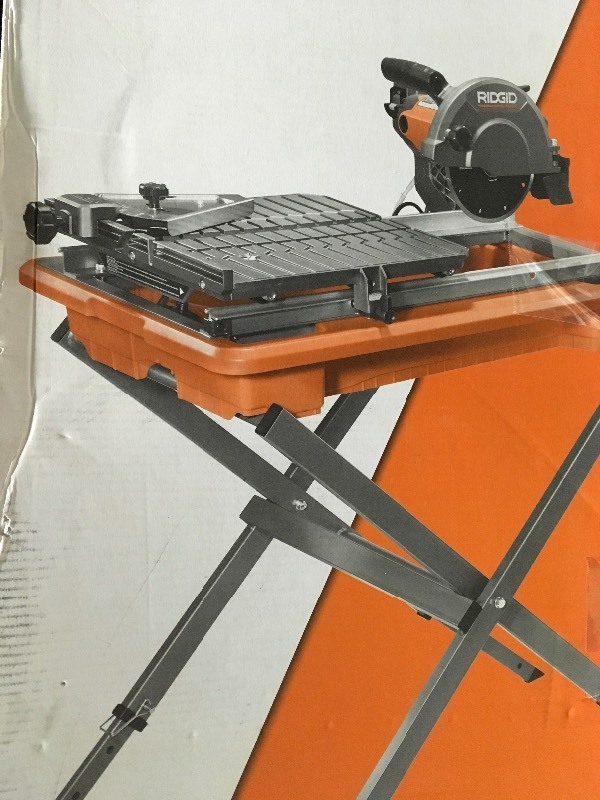 lot 105 image: Ridged 7 in Wet Tile Saw in good working condition