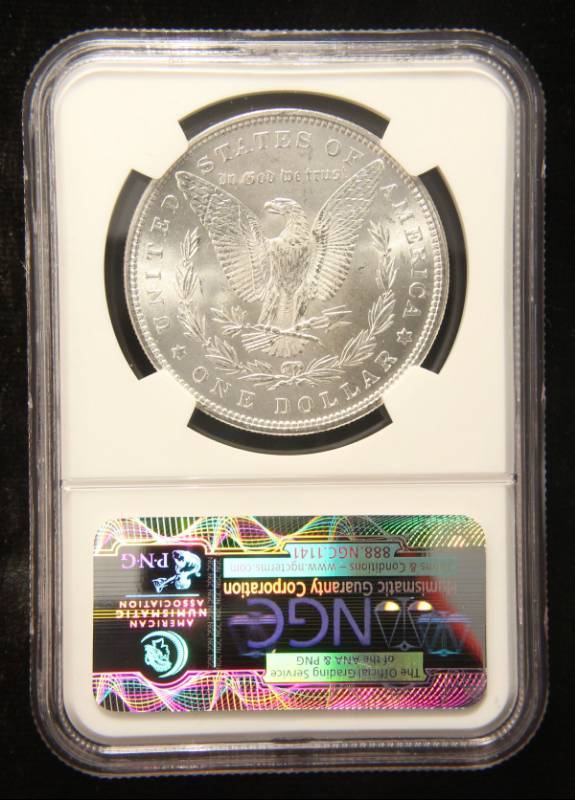 lot 13 image: 1885 MORGAN SILVER DOLLAR MS63 NGC