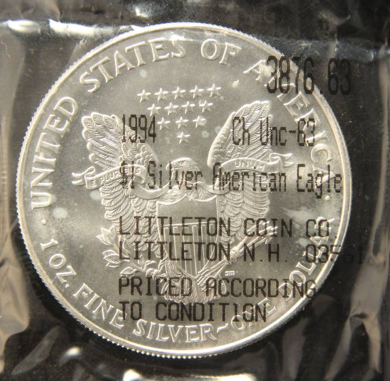 lot 14 image: 1994 AMERICAN SILVER EAGLE 1 TROY OZ. .999 FINE SILVER SEALED LITTLETON
