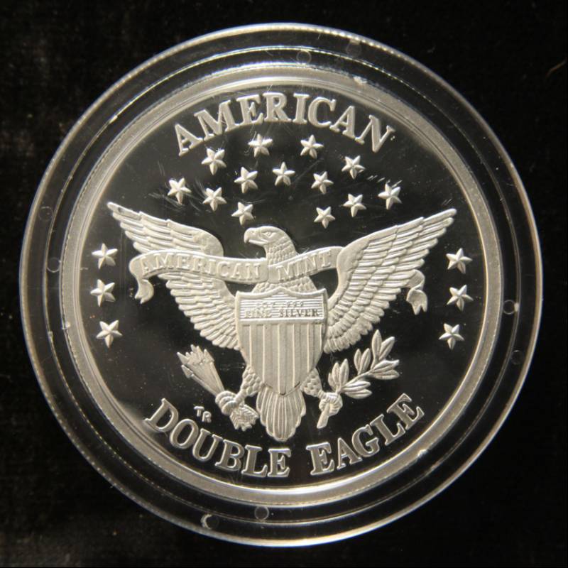 lot 15 image: 1 TROY OZ. .999 FINE SILVER 1985 DOUBLE EAGLE DESIGN AMERICAN MINT IN AIRTITE