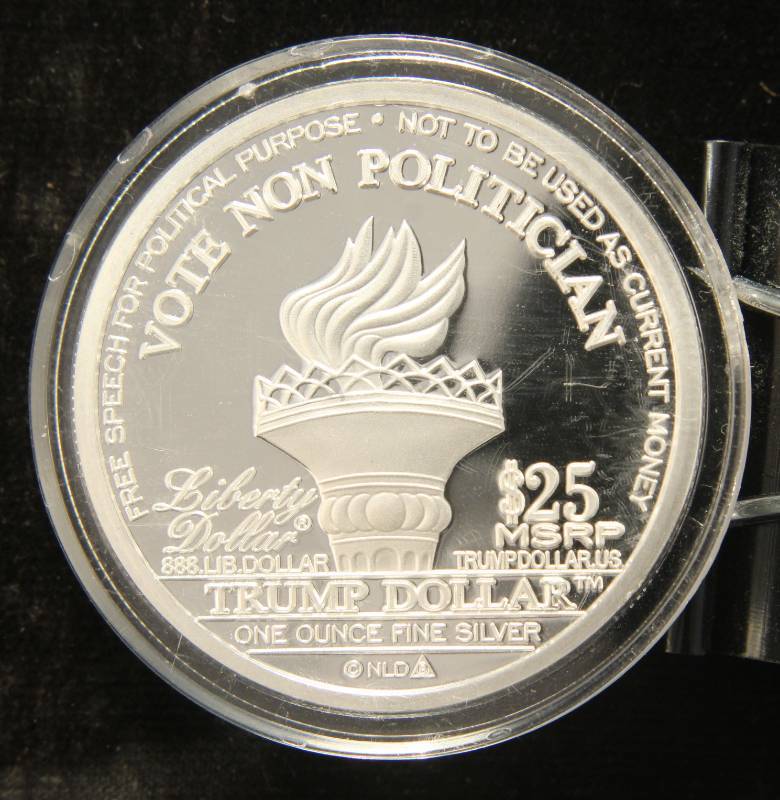 lot 19 image: 1 TROY OZ. .999 FINE SILVER DONALD TRUMP ELECTION ROUND IN AIRTITE HOLDER