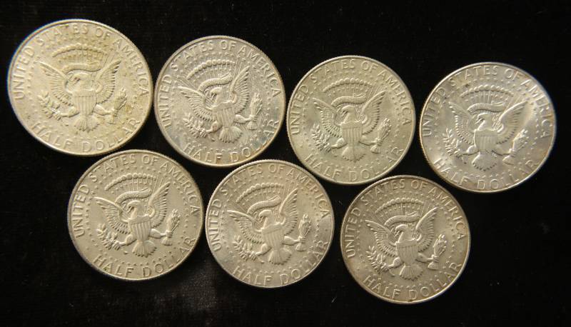 lot 49 image: GROUP OF 7 US KENNEDY 40% SILVER HALF DOLLARS 1965-1969
