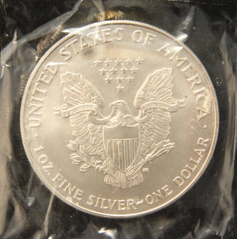lot 52 image: 1997 AMERICAN SILVER EAGLE 1 TROY OZ. .999 FINE SILVER SEALED LITTLETON