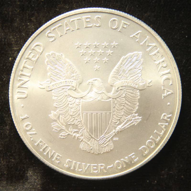 lot 60 image: 1998 AMERICAN SILVER EAGLE 1 TROY OZ. .999 FINE SILVER DOLLAR