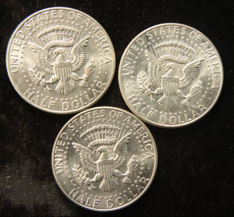 lot 65 image: 3 UNCIRCULATED 1964 KENNEDY SILVER HALF DOLLARS