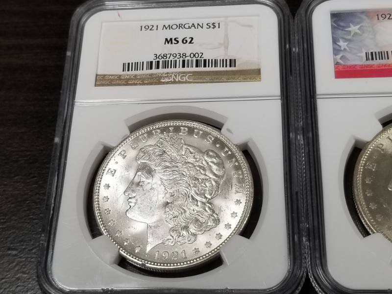 GROUP OF 3 1921 MORGAN SILVER DOLLARS (2) MS62 NGC (1) MS63 PCGS