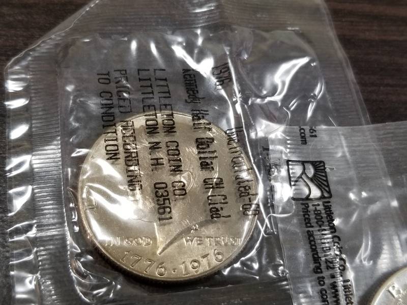 GROUP OF 3 KENNEDY HALF DOLLARS IN SEALED LITTLETON PLASTIC