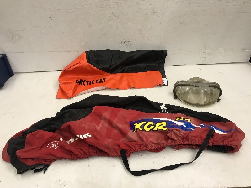lot 37 image: Snowmobile Seat Cover, Storage Cover, Headlight