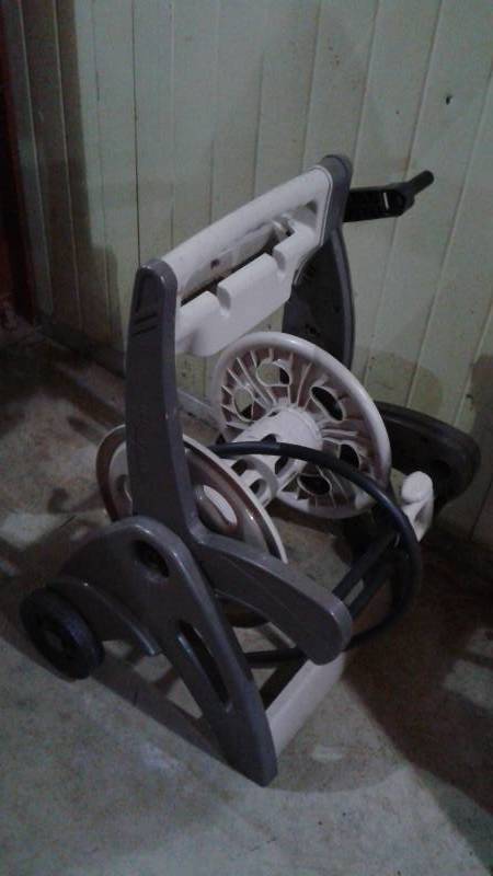lot 16 image: Garden Hose Rolling Cart, Used