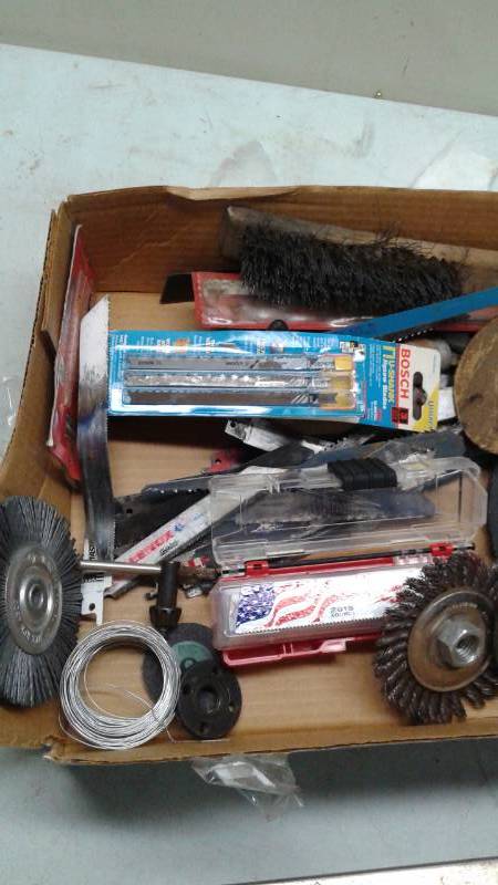lot 23 image: Box With Saw Blades, Grinder Blades, Some Used And Unused