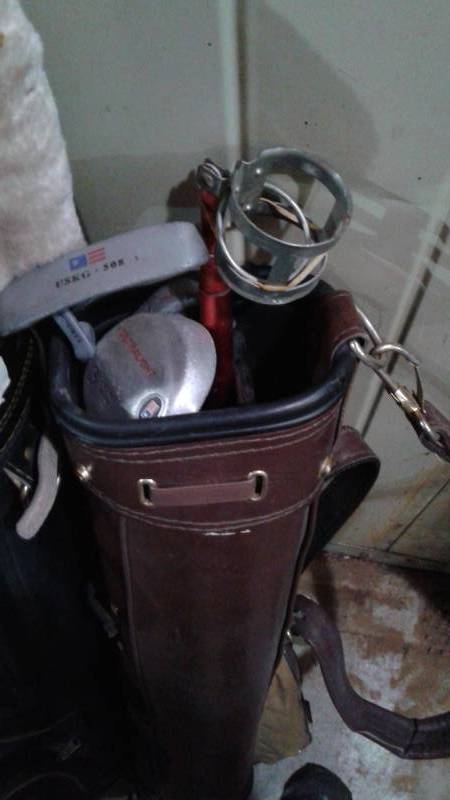 lot 60 image: Lot Of Golf Clubs, Bags, And A Hockey Stick