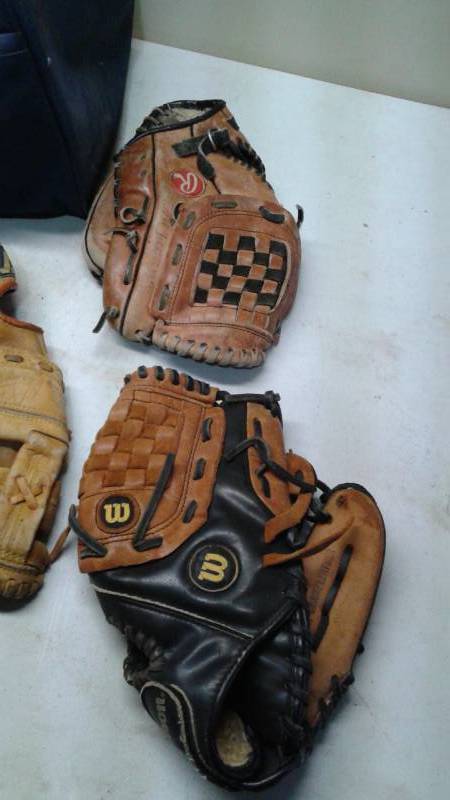 lot 61 image: Bag Filled With Baseball Gloves