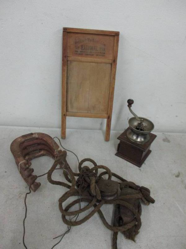 lot 40 image: Washboard, Coffee grinder, Horseshoes, Rope and Pulleys