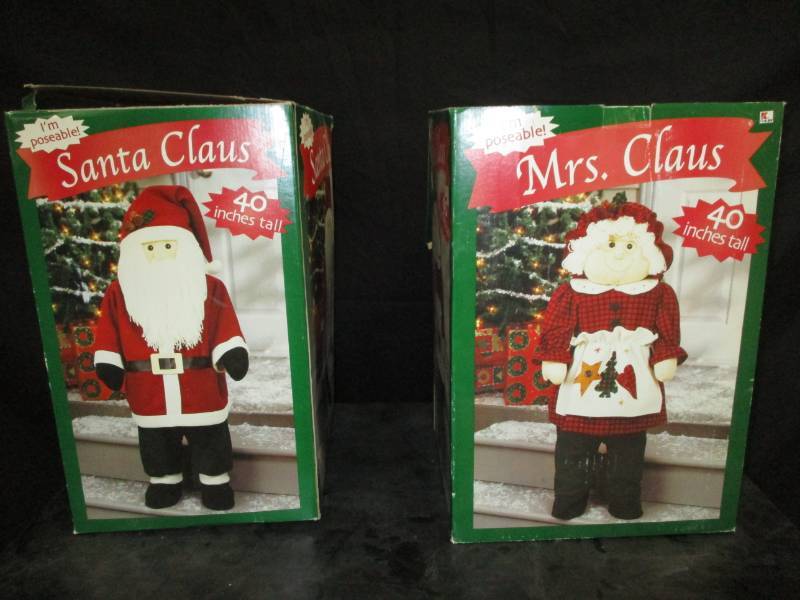 lot 52 image: Mr. and Mrs. Claus large posable dolls