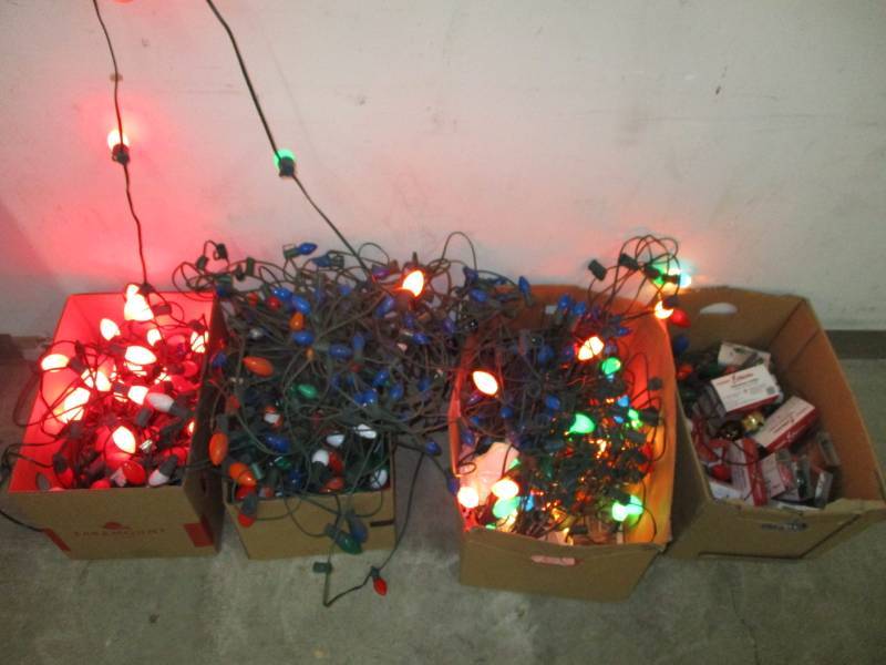 lot 59 image: 4 boxes of the old big lights and refil bulbs