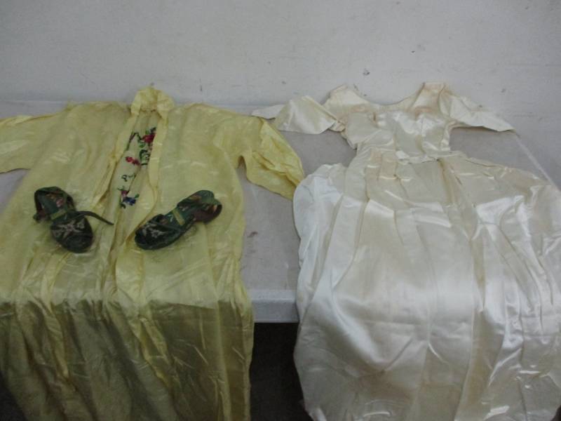 lot 73 image: Kimono dress wwooden shoes and wedding dress