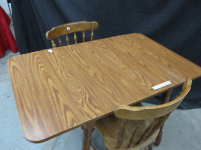 lot 96 image: Drop Leaf dining room table with two chairs