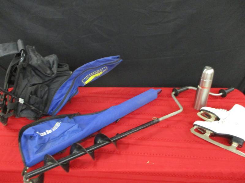 lot 114 image: Thermos, ice skates, ice auger, portable rod holder and ice fishing backpack