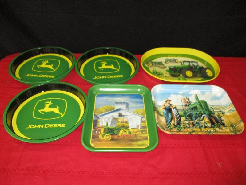 lot 123 image: 7 John Deere Metal Serving Trays